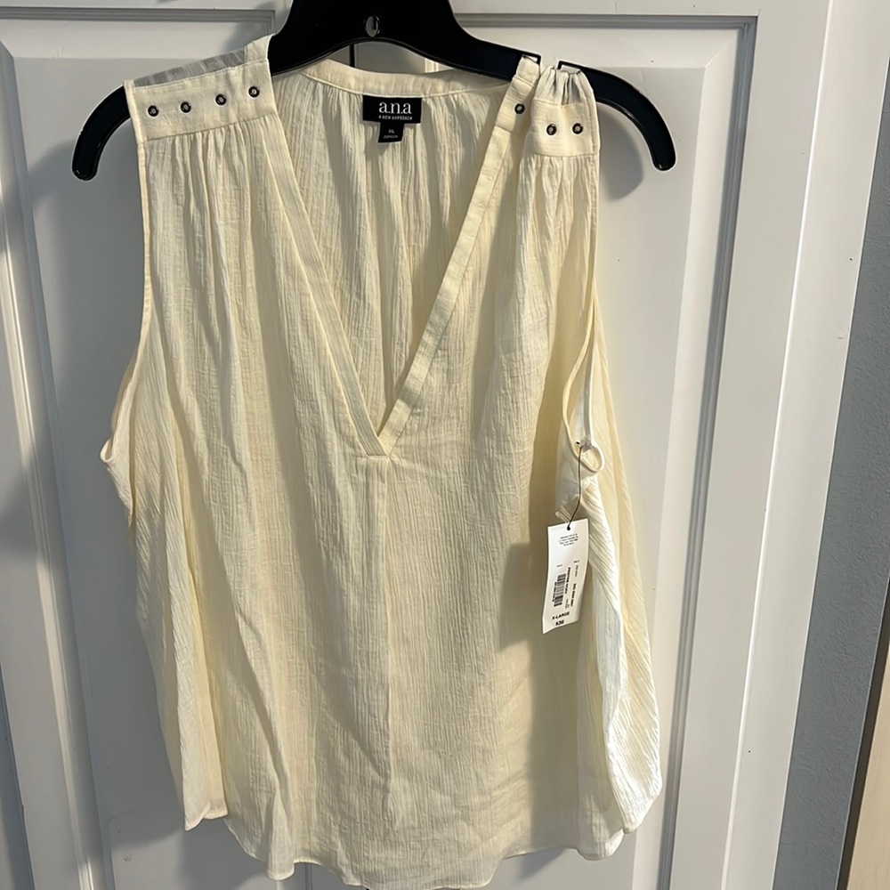 New with tags . Off white blouse